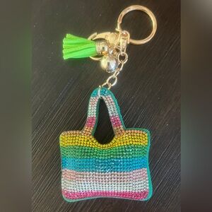 Brand New Colorful Rhinestone Keychain with Green Tassel in a mesh pouch